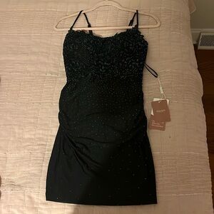 Selling a brand new homecoming dress